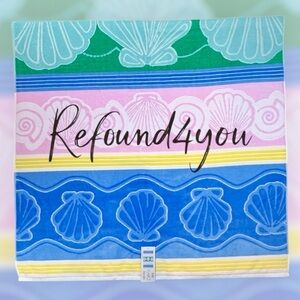 Caro - ‘Pastel Sea Shells’ Plush beach towel.  NWT Firm!
